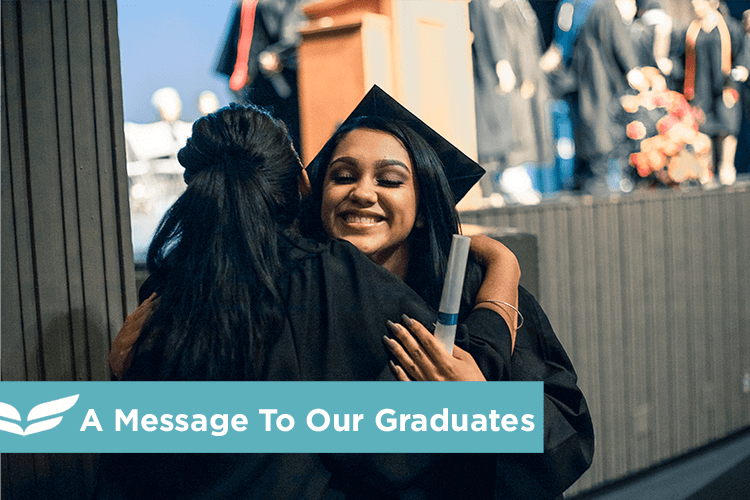 UEI College female graduate